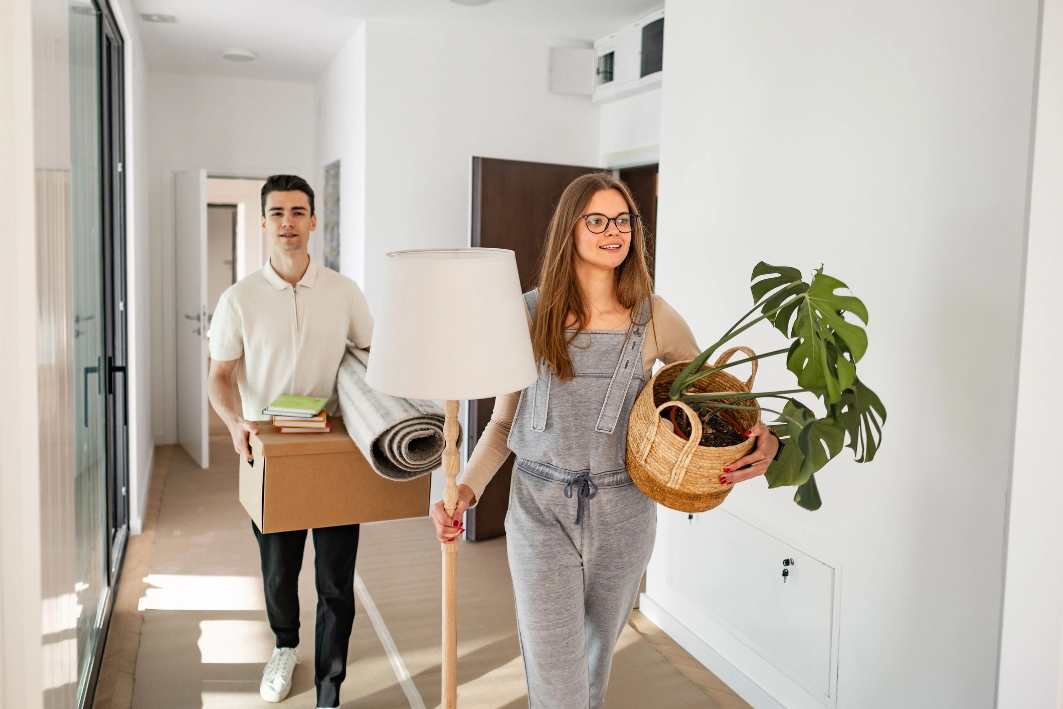 Removal team helping customers move into a new home